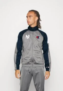 Champion NEW YORK YANKEES TRACKSUIT - Trainingsanzug - Grey/dark Blue 11 Champion NEW YORK YANKEES TRACKSUIT - Trainingsanzug - Grey/dark Blue -Herrenbekleidungsgeschäft cd9bf984cf0140348c03213a53b70006